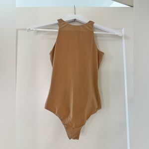 SKIMS fits everybody high neck bodysuit